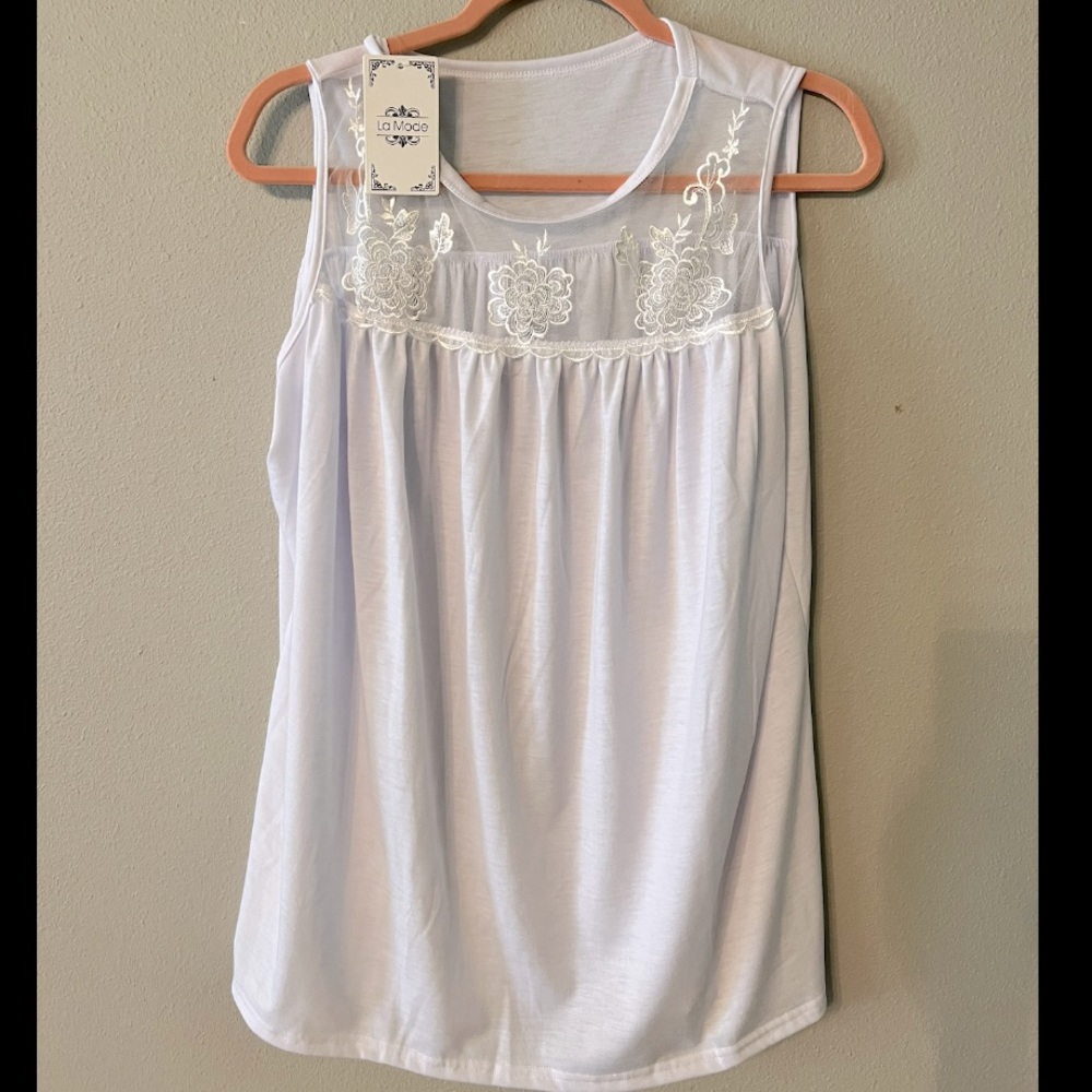 White lace sleeveless top